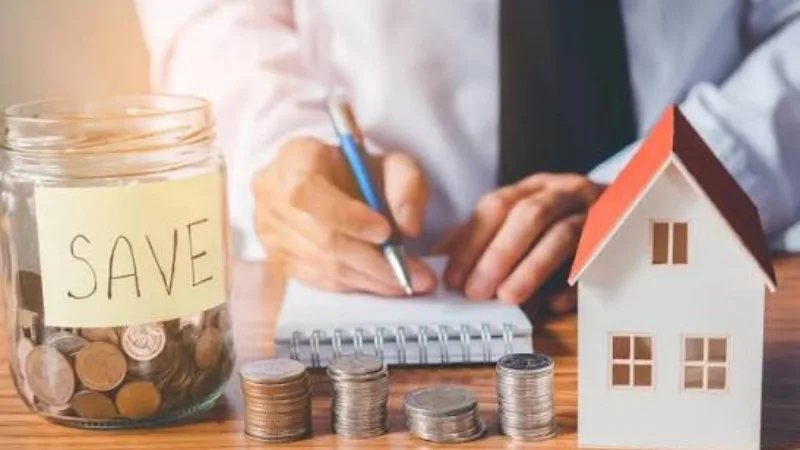 Ghi chép kế hoạch tài chính bên cạnh mô hình ngôi nhà